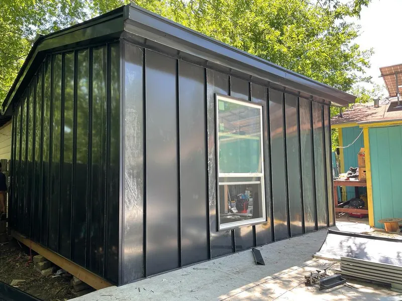 Black standing seam metal wall panels for Metal Roof Installation in Schoolcraft