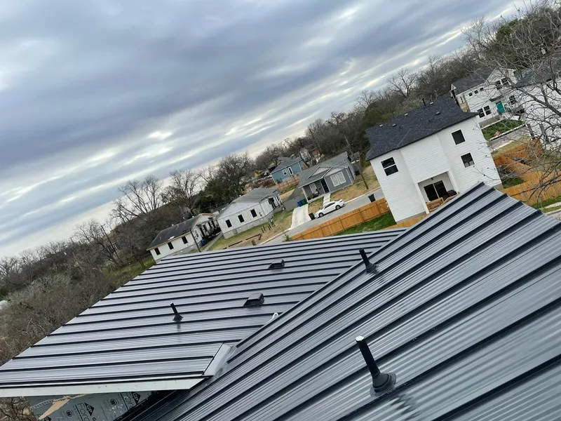 Standing seam metal roof panels with vents for Skylight Repair in Schoolcraft